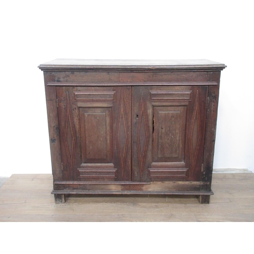 593 - An antique oak Cupboard with moulded cupboard doors, 3 ft 7 in W  3 ft H x 17 in D.