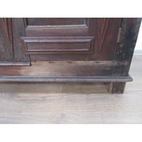 593 - An antique oak Cupboard with moulded cupboard doors, 3 ft 7 in W  3 ft H x 17 in D.