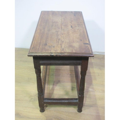 601 - A small 18th Century oak Centre Table with carved frieze and turned supports, possibly with later to... 