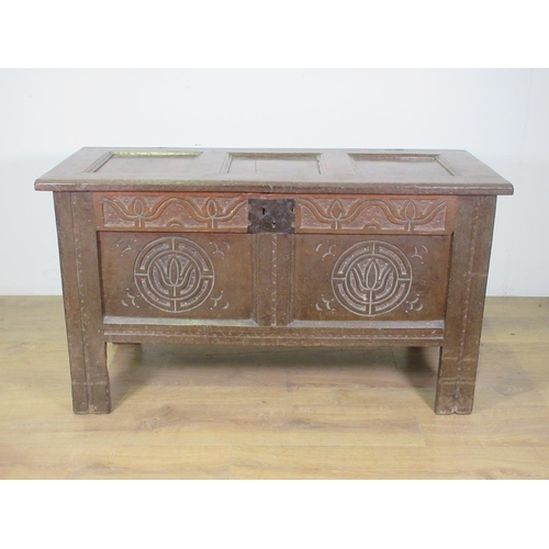 602 - A small 17th Century and later oak Coffer with panelled top and carved panelled front, 3 ft 7 in W.