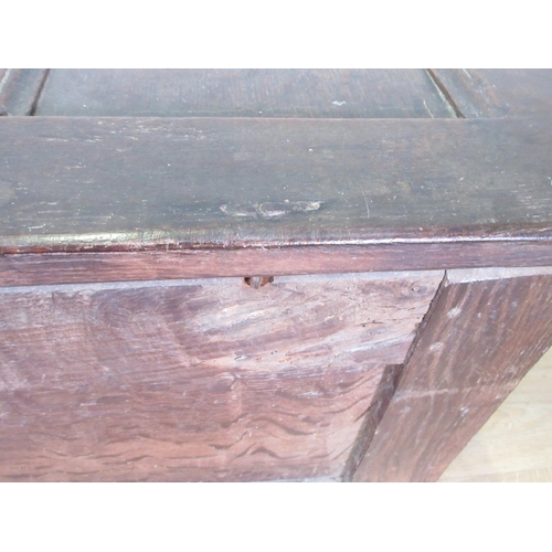 602 - A small 17th Century and later oak Coffer with panelled top and carved panelled front, 3 ft 7 in W.