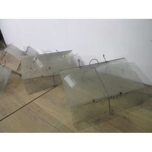 629 - Eight glass and wire Cloches and spare glass 2ft L