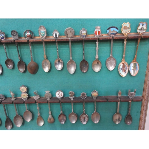 646 - A Rack with a collection of Commemorative Spoons 3ft 6in W x 2ft 4in H