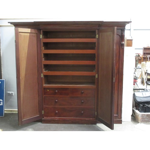 652 - A good quality Victorian flame mahogany Breakfront Wardrobe fitted four arched panel doors, the cent... 