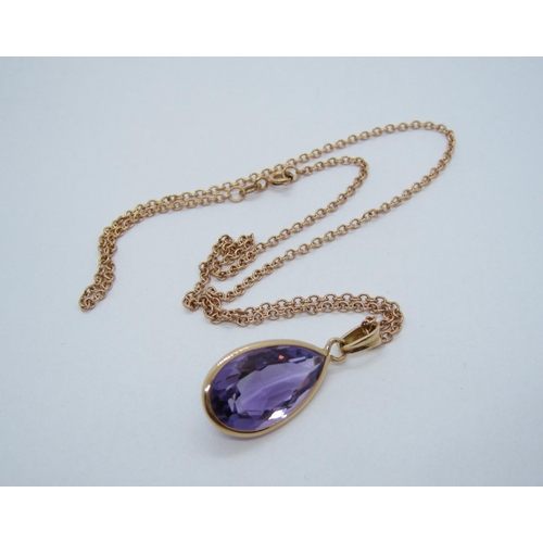 122 - An Amethyst Pendant set single pear-cut stone on fine 9ct rose gold chain.