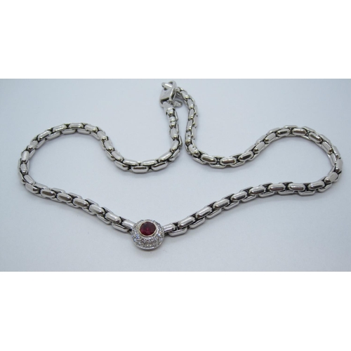 128 - A Ruby and Diamond Necklace, the front rubover-set round ruby 0.56ct within domed frame pave-set num... 