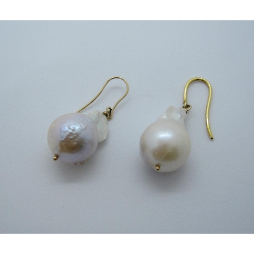 99 - A pair of Baroque freshwater Pearl Drop Earrings on wire fittings