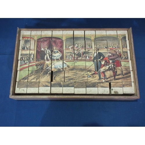 190 - A Victorian wooden block Puzzle in box and a pair of reproduction tin toleware style Trays