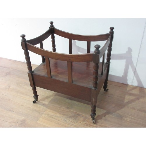 653 - A mahogany Canterbury on bobbin turned supports and brass casters 1ft 10in H x 1ft 8in W