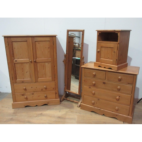 511 - A pine Chest of two short and three long drawers 3ft W x 2ft 10in H, a Cupboard fitted pair of cupbo... 