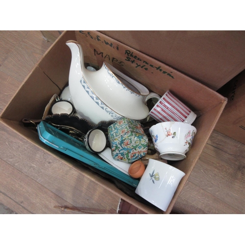 561 - Three boxes of china, glass, raquets, etc.