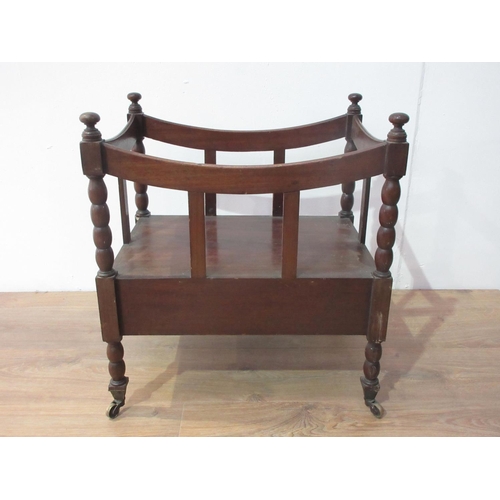 653 - A mahogany Canterbury on bobbin turned supports and brass casters 1ft 10in H x 1ft 8in W