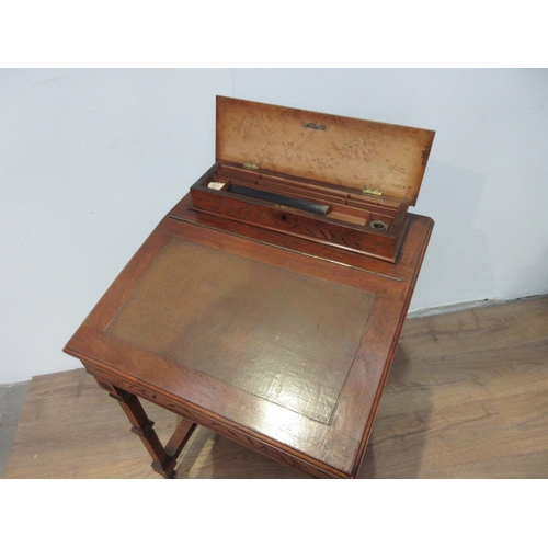 523A - An Edwardian walnut Davenport Desk with hinged inkwell, fitted drawers to one side and dummy drawers... 