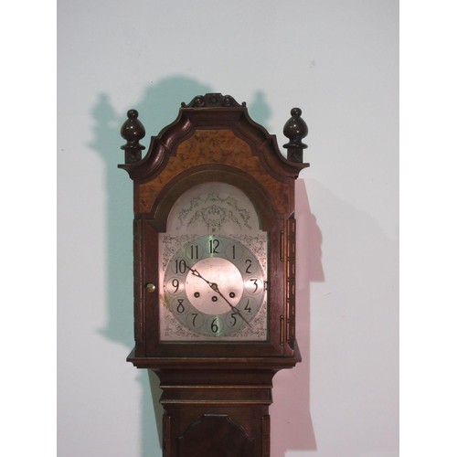 504 - A reproduction walnut cased Grandmother Clock with silvered dial 5ft 9in H (lacking pendulum)