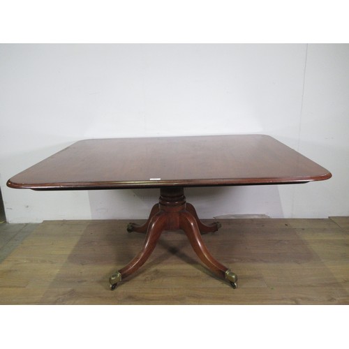 471 - A 19th Century mahogany Dining Table with tilt top mounted upon turned column and four outswept supp... 