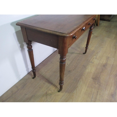 492 - A Victorian mahogany Side Table fitted two frieze drawers with knobs mounted on turned and tapering ... 