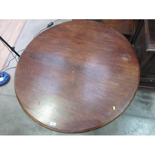 518 - A 19th Century mahogany Breakfast Table on octagonal column and three brass casters 3ft 10in D x 2ft... 