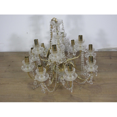 523 - A cut glass and brass Chandelier with two rows of eight and four branches with droplets 2ft D x 1ft ... 