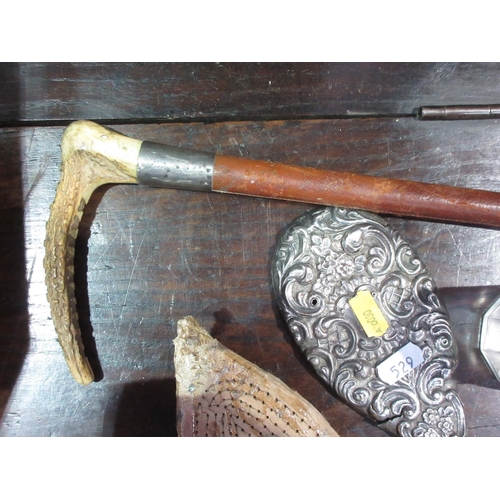 529 - An antler handled Riding Crop with silver collar, a silver topped Powder Dispenser and a silver back... 