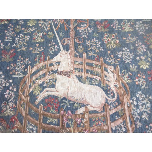 628 - A needlepoint Tapestry in the Medieval style depicting a Unicorn 4ft 6in H x 3ft 6in W and oak frame... 