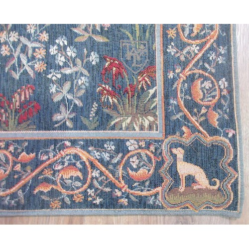 628 - A needlepoint Tapestry in the Medieval style depicting a Unicorn 4ft 6in H x 3ft 6in W and oak frame... 