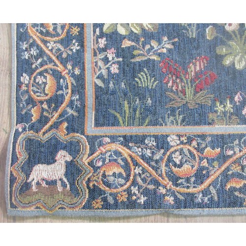 628 - A needlepoint Tapestry in the Medieval style depicting a Unicorn 4ft 6in H x 3ft 6in W and oak frame... 