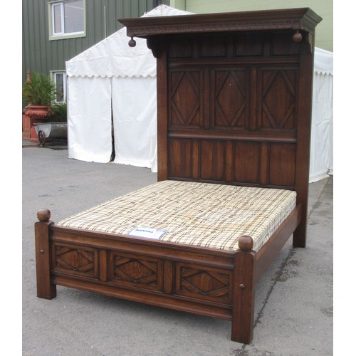 642 - A well made panelled oak Half Tester Bed in the 17th Century style with fitted mattress, the canopy ... 