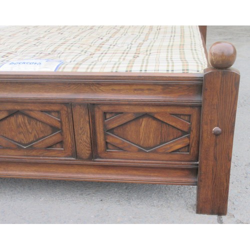 642 - A well made panelled oak Half Tester Bed in the 17th Century style with fitted mattress, the canopy ... 