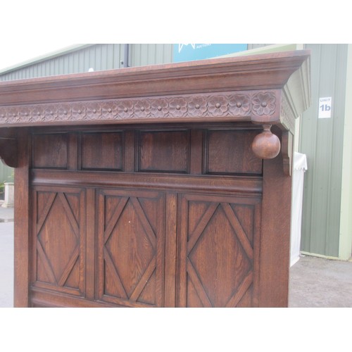 642 - A well made panelled oak Half Tester Bed in the 17th Century style with fitted mattress, the canopy ... 