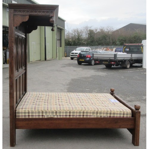 642 - A well made panelled oak Half Tester Bed in the 17th Century style with fitted mattress, the canopy ... 