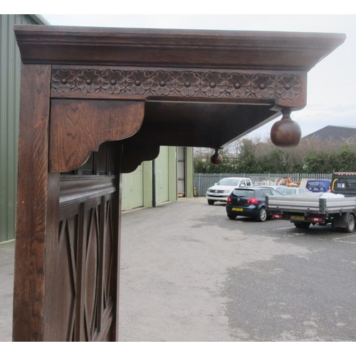 642 - A well made panelled oak Half Tester Bed in the 17th Century style with fitted mattress, the canopy ... 