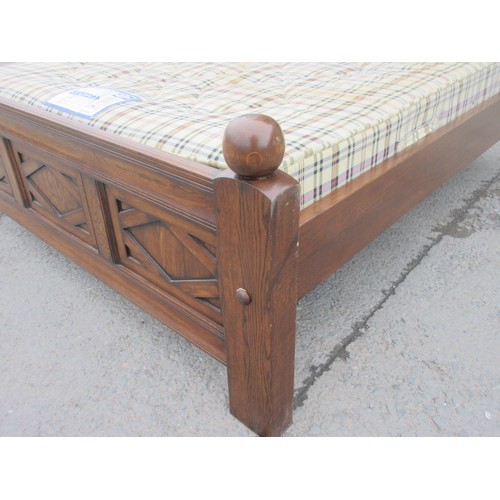 642 - A well made panelled oak Half Tester Bed in the 17th Century style with fitted mattress, the canopy ... 