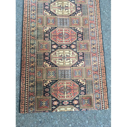 19 - A very long Hall Runner with geometric design within multiple borders 19ft 4in L x 2ft 3in W