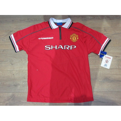 118 - A Manchester United Football Shirt signed by Cole