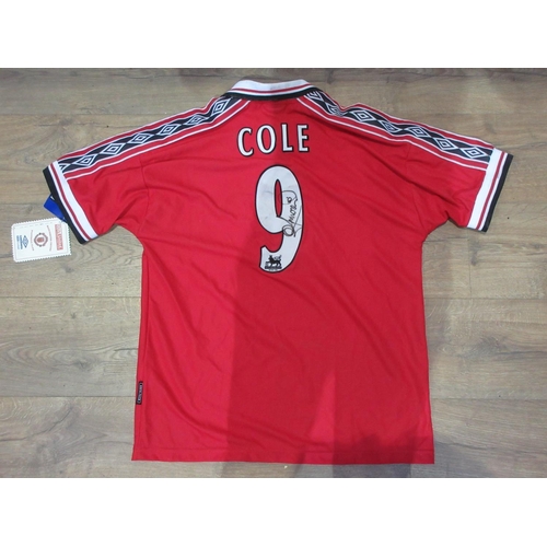 118 - A Manchester United Football Shirt signed by Cole