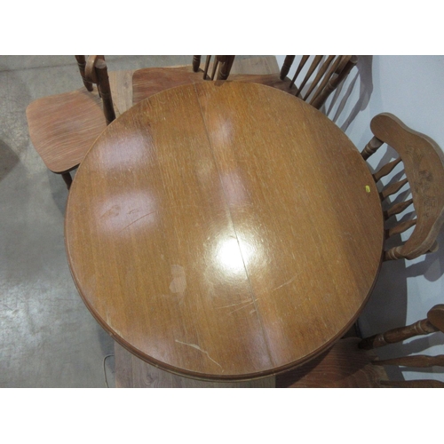 125 - A modern pine circular Dining Table 3ft 9in W with spare leaf and six Chairs