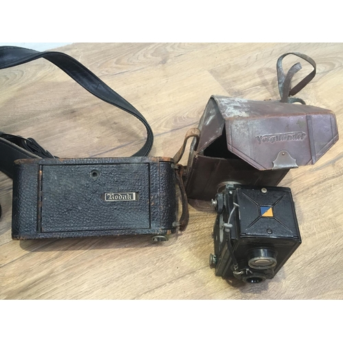 136 - A Pentax Camera, a Kodak Camera and a Box Camera