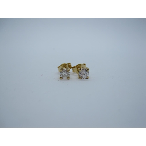 163 - A pair of Diamond Ear Studs each claw-set brilliant-cut stone in 18ct gold, total diamond weight 0.6... 