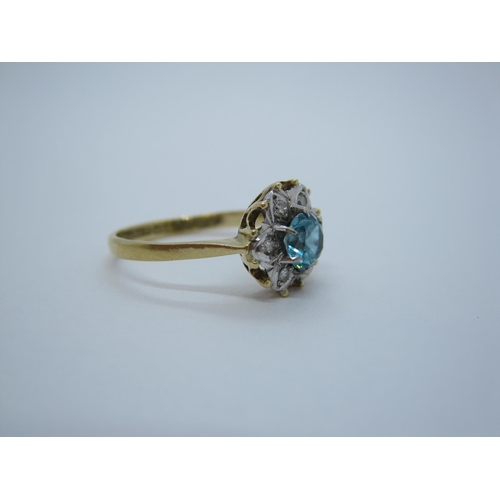 168 - A Zircon and Diamond Cluster Ring claw-set round blue zircon within illusion-set eight-cut diamonds ... 