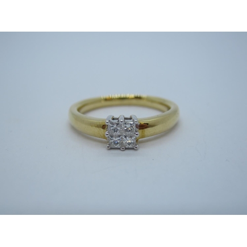 190 - A contemporary Diamond Ring peg-set cluster of four princess-cut stones in 18ct gold, ring size L.