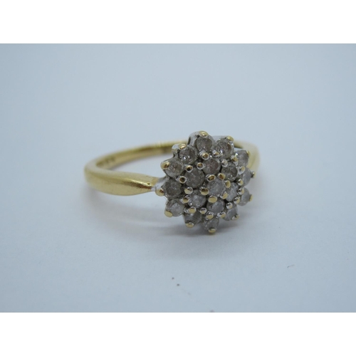 212 - A Diamond Cluster Ring peg-set nineteen brilliant-cut stones in 18ct gold, ring size M1/2, approx 3.... 