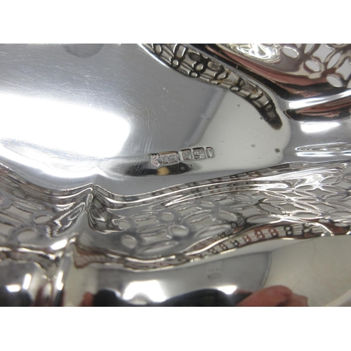 228 - An Edward VII silver pierced oval Dish, Sheffield 1903, 10 in, 202 gms.