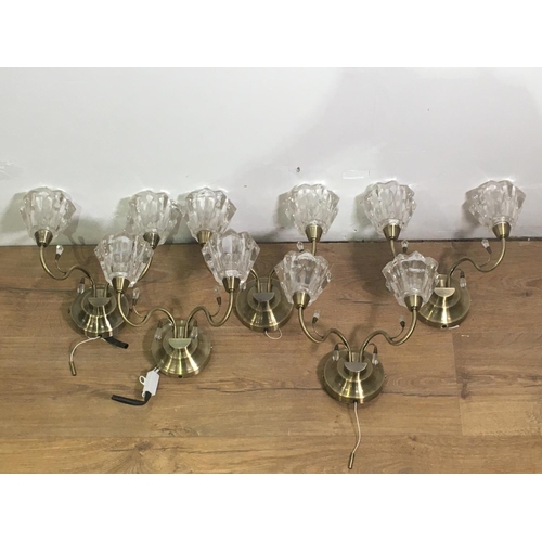 347 - Five modern brass two branch Wall Lights with heavy glass shades 11in W