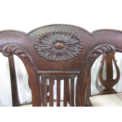 373 - A set of seven reproduction mahogany Dining Chairs with harp backs