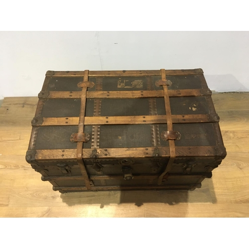 414 - An antique canvas and oak bound Trunk 3ft W x 2ft H