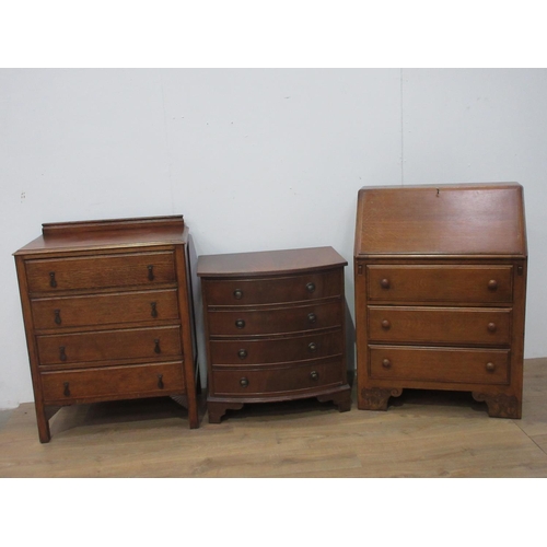 430 - An oak Chest of four drawers 2ft 6in W, an oak Bureau 2ft 6in W and a reproduction mahogany veneered... 