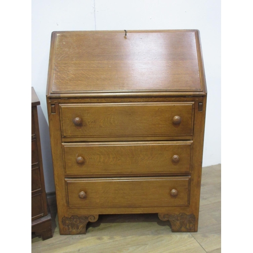 430 - An oak Chest of four drawers 2ft 6in W, an oak Bureau 2ft 6in W and a reproduction mahogany veneered... 