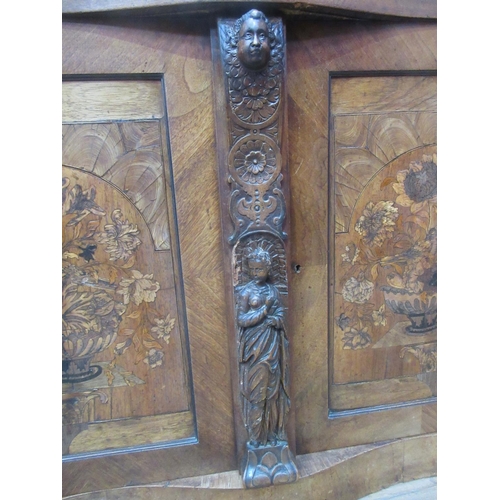 441 - An antique walnut and marquetry serpentine Chiffonier fitted pair of panelled doors flanking carved ... 