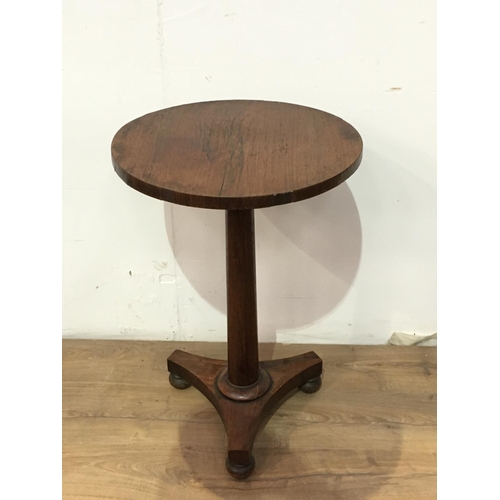 493 - A Victorian rosewood circular Occasional Table mounted upon three bun feet 1ft 6 1/2in D