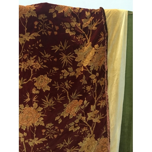 499 - A pair of deep red double lined Curtains with gold decoration of flowers 7ft 10in L x 9ft 8in W and ... 